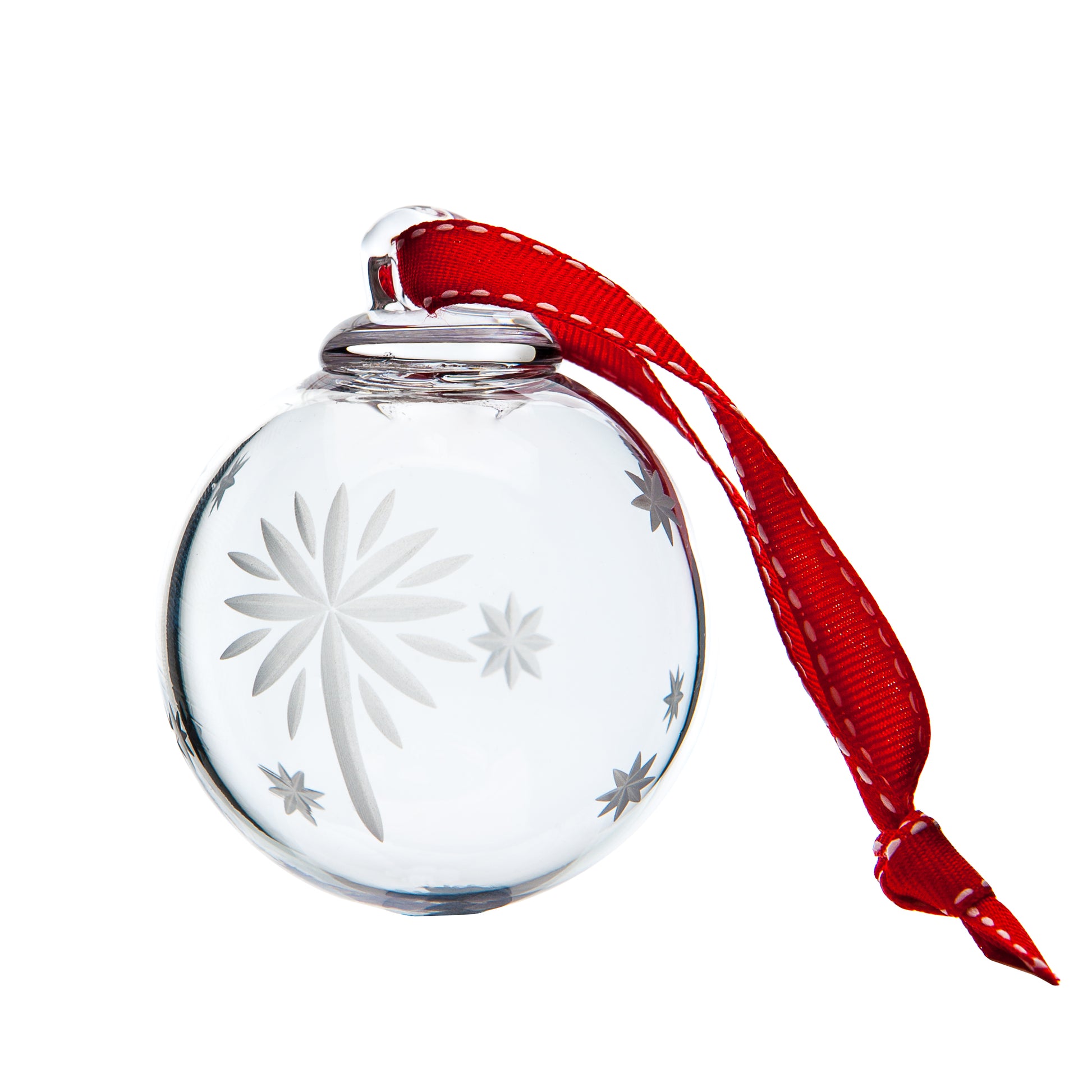 Clear glass round North Star bauble etched with star motifs, hung by a red ribbon.