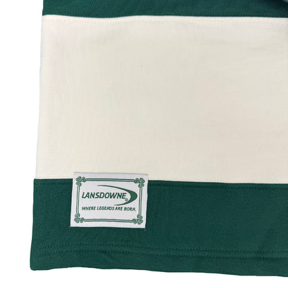 Close-up of the Lansdowne label on the striped rugby shirt hem.