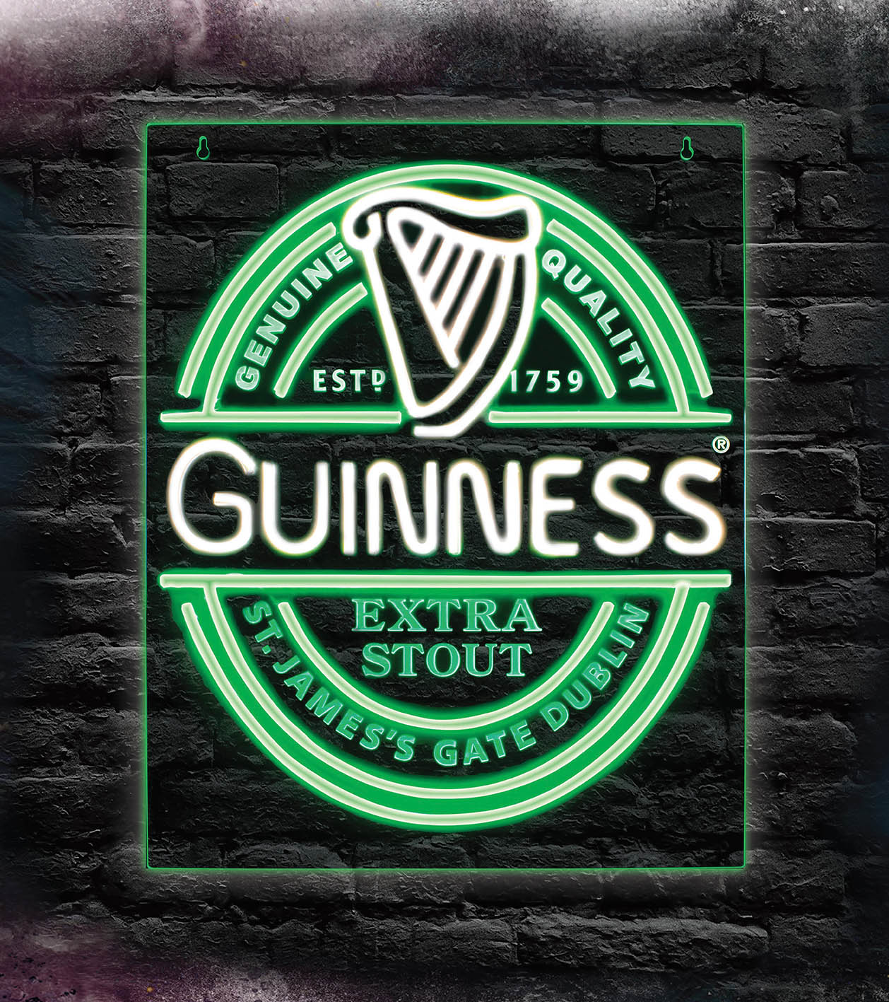 Green neon Guinness sign with harp logo against a brick wall