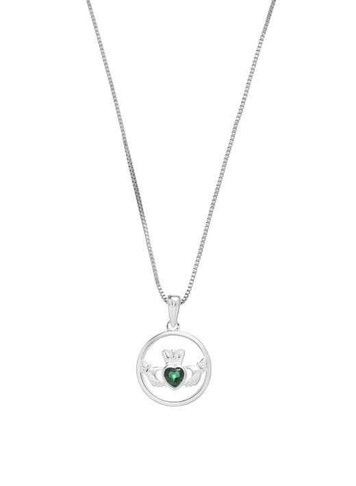 Silver necklace with circular pendant featuring crowned hands holding green heart gem
