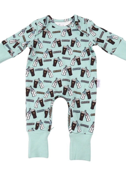 Close-up of a teal Cheers baby onesie with drink cup and bottle illustrations and folded cuffs