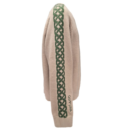 Beige stone Celtic Knot crew neck sweater with a bold green braided pattern down the sleeve.