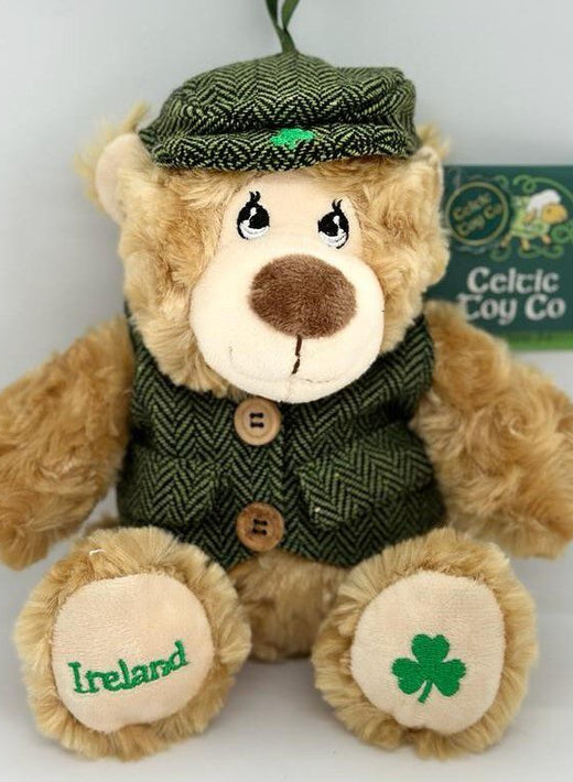Teddy bear wearing green tweed hat and vest with shamrock and Ireland embroidery