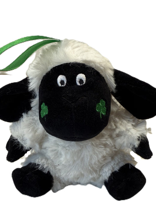 Plush black and white sheep with green shamrocks on cheeks and hanging loop