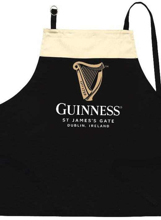 Black apron with beige top section and Guinness harp logo and text