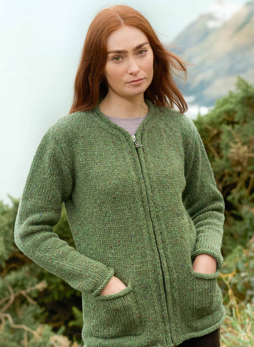 Sage green Inishowen Donegal wool zip Aran cardigan with pockets and zip front.